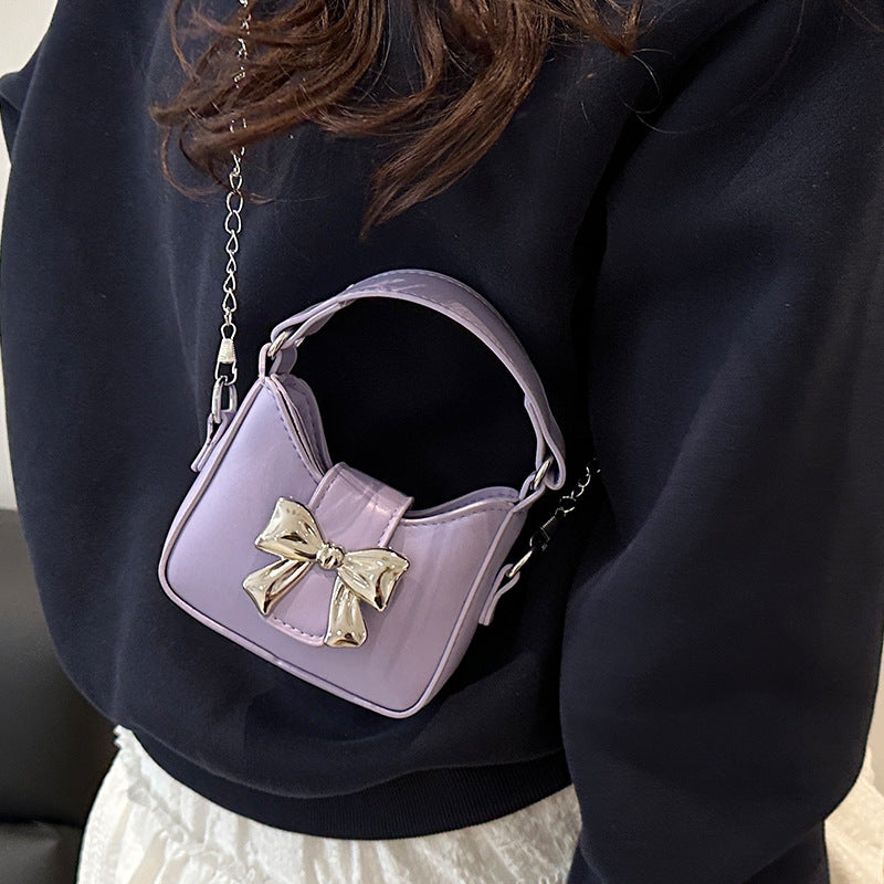 Damen Mini-Handtasche mit stylischem Schleifenverschluss