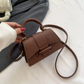 Damen Mini-Handtasche aus strukturiertem Leder mit stylischer Verschluss