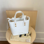 Damen Mini Tasche mit eleganter Struktur und praktischem Tragegriff