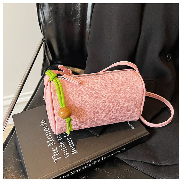 Damen Schultertasche aus hochwertigem synthetischem Leder mit buntem Kordelzug