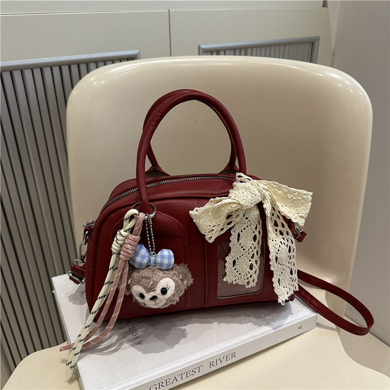Damen Mini-Handtasche mit verspieltem Tiermotiv und charmantem Anhänger
