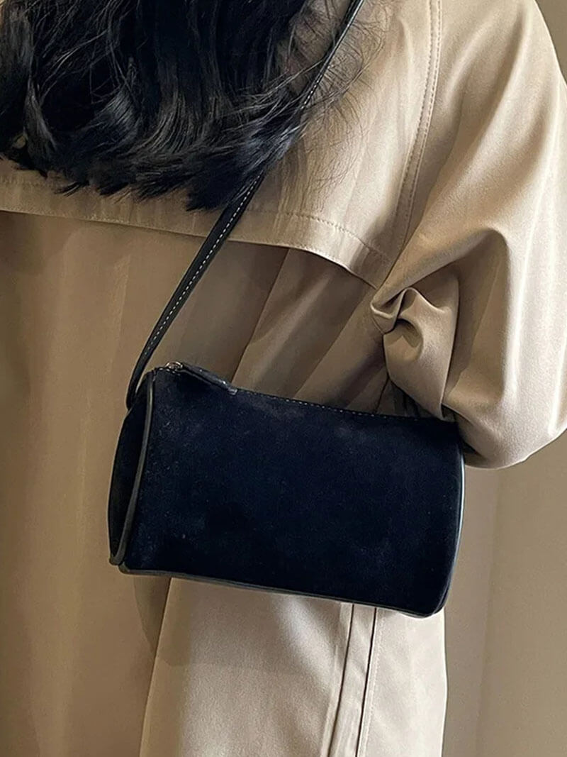 Elegante Schultertasche aus Wildleder